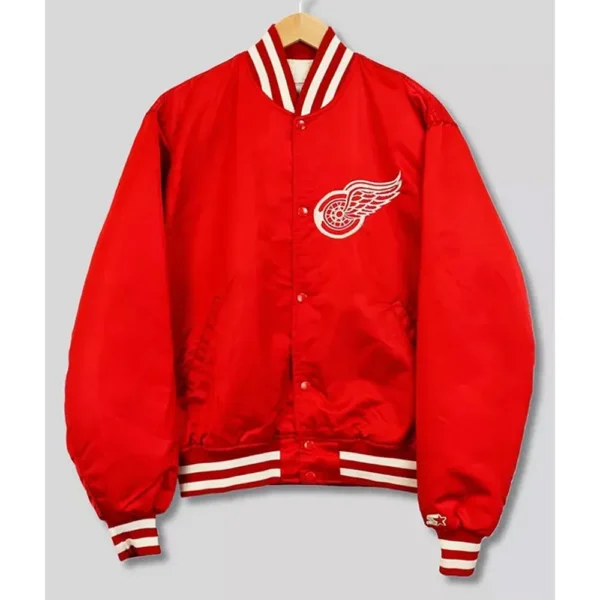 Unisex Detroit Red Wings 90’s Red Bomber Jacket (2) Product Specifications Inspired By: Hockey Team Detroit Red Wings Material: Satin Lining: Soft Viscose Lining Style: Varsity Jacket Collar: Ribbed Collar Sleeves: Full Sleeves with Rib-Knit Cuffs Closure: Snap-Tab Buttoned Front Pockets: Two Side Waist Pockets and One Inner Pocket Color: Red